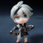 Крупний план обличчя та білого волосся на чібі фігурці Young Nier з гри NieR Replicant.